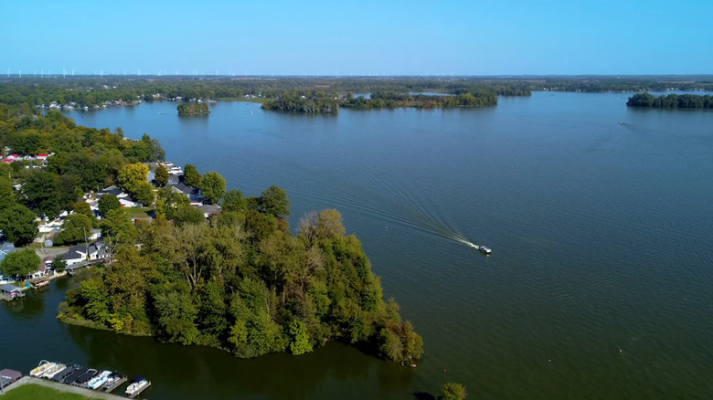 Indian Lake as a lone speedboat cuts through the water
