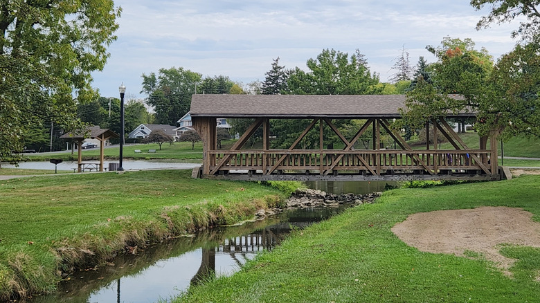 Local park with a bridge across a stream in Clyde, Ohio
