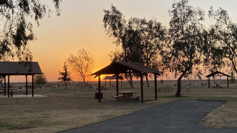 A google reivew photo shows a sunset over the camping area at Colonel Allensworth State Historic Park