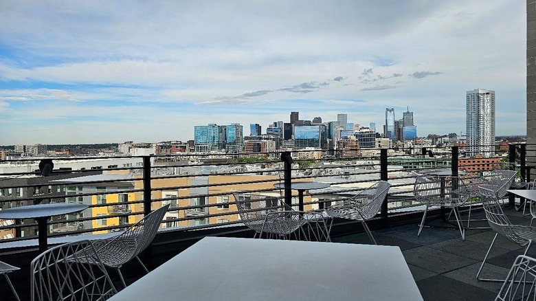 View of Denver's skyline from rooftop patio at El Five