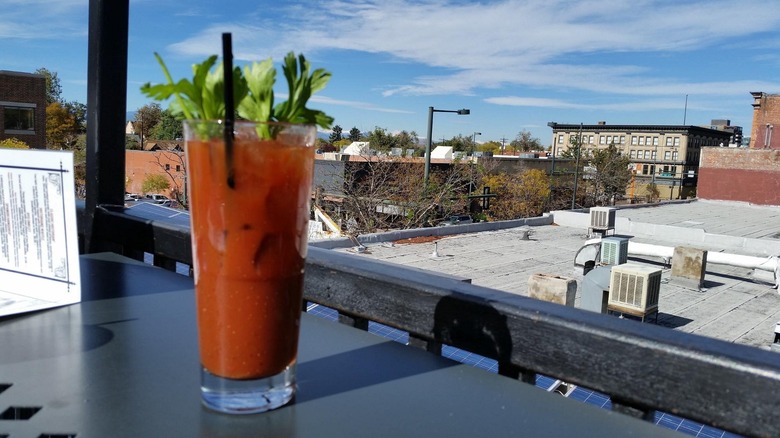 Bloody mary cocktail enjoyed on rooftop patio