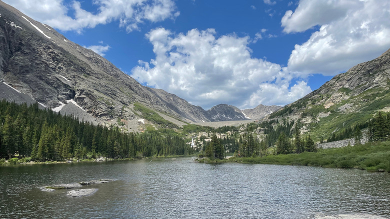Grand Lake in Colorado surrounded by gray peaks and green pines