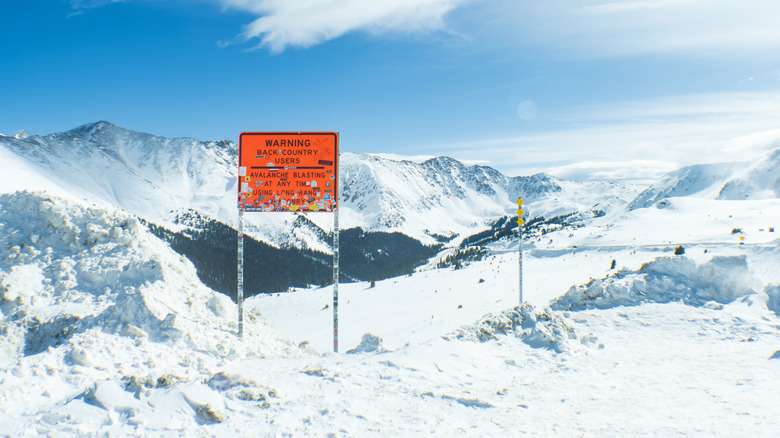 Back country skiing sign on a snowy slope in Colorado