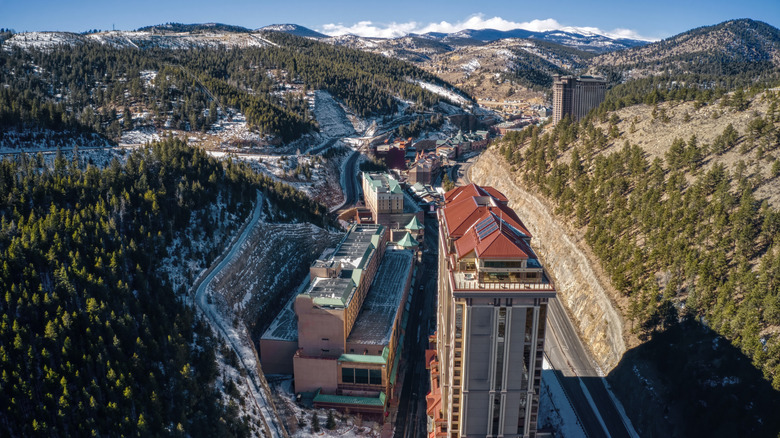 Aerial view of Black Hawk, Colorado buildings and mountains.