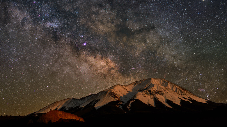 Constellations behind snowy Spanish Peaks