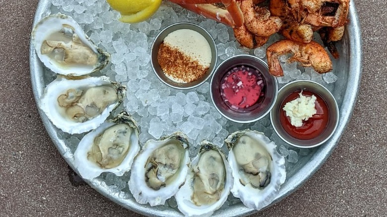 Crackerjax oysters on a shellfish platter from the chilled raw bar at Jax Fish House & Oyster bar in Colorado.
