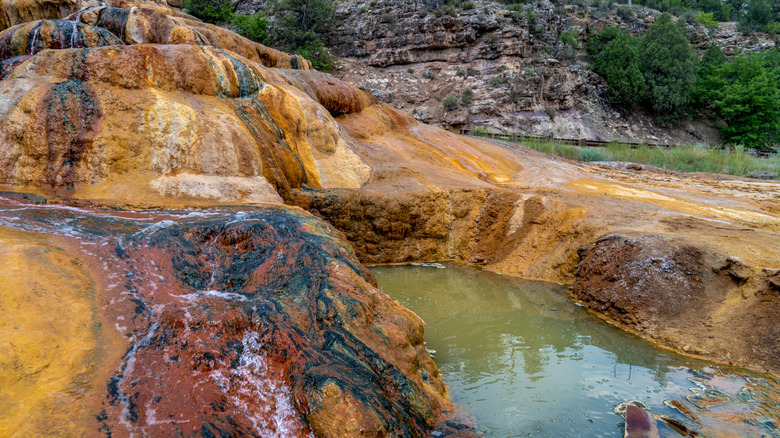 Rock mound next to a small pool at Pinkerton Hot Springs