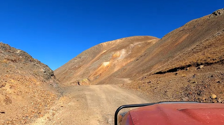 Dirt trail along Como, Colorado, between dunes