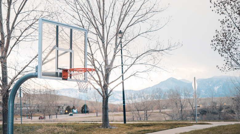 Outdoor basketball courts in Superior with mountain in the background