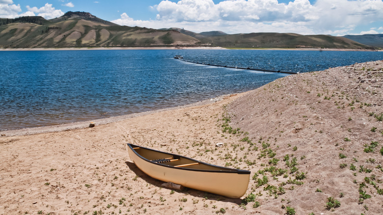 A canoe on the beach at Blue Mesa Reservoir