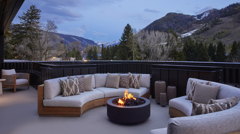 View of the mountains from the expansive terrace on the Ajax Penthouse suite at the White Elephant Aspen