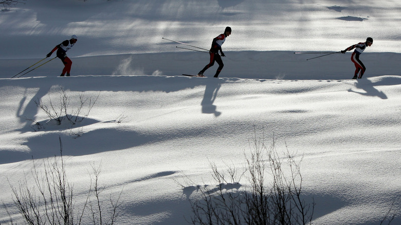Competitors ski in the cross country portion of the Nordic Combined Championships at Howelsen Hill