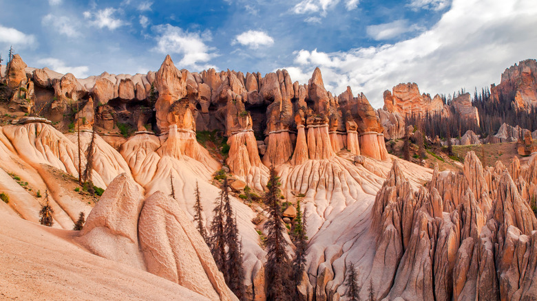 Wheeler Geologic Area with blue skies and white clouds above