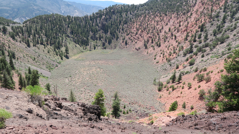 The sagebrush-filled crater and pine-filled surroundings of Dotsero, the only active volcano in Colorado.
