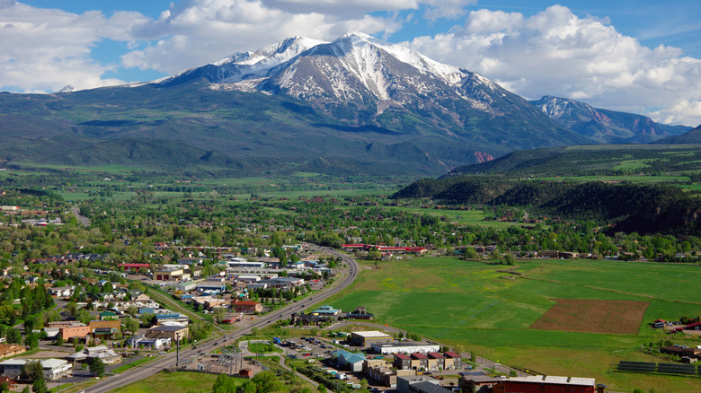 Aerial view of Carbondale, Colorado, flanked by a mountain