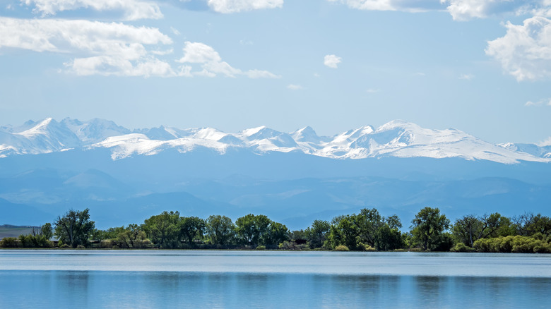 Rocky Mountains as seen from from Barr Lake in Barr Lake State Park in Colorado