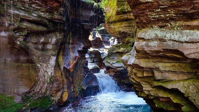 Waterfall and mossy cliffs at Little Hawaii outside of Telluride, Colorado