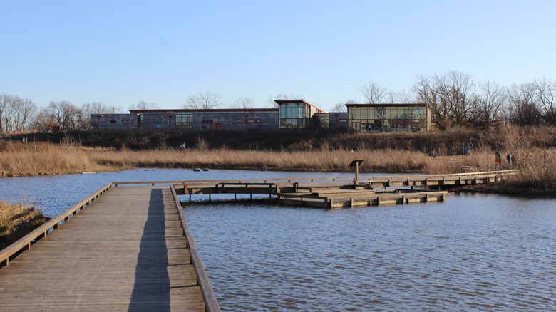 Grange Insurance Audubon Center in front of lake with pier