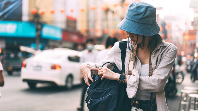 Girl with a backpack in Asia