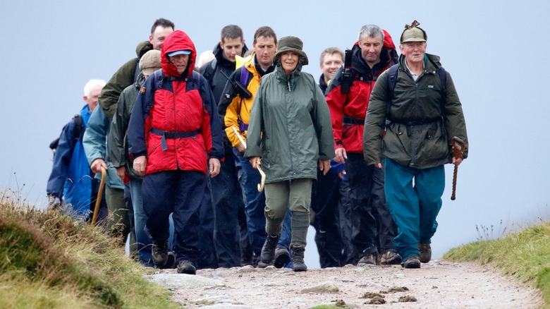 A group of hikers wearing waterproof jackets