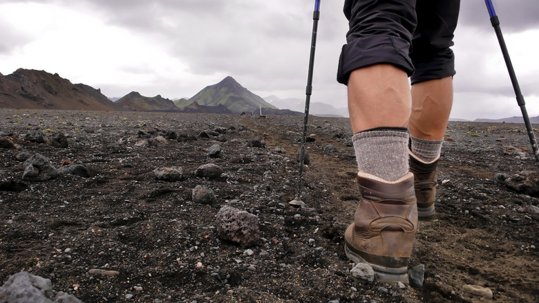 Close up of the feet of a person wearing hiking boots in Iceland