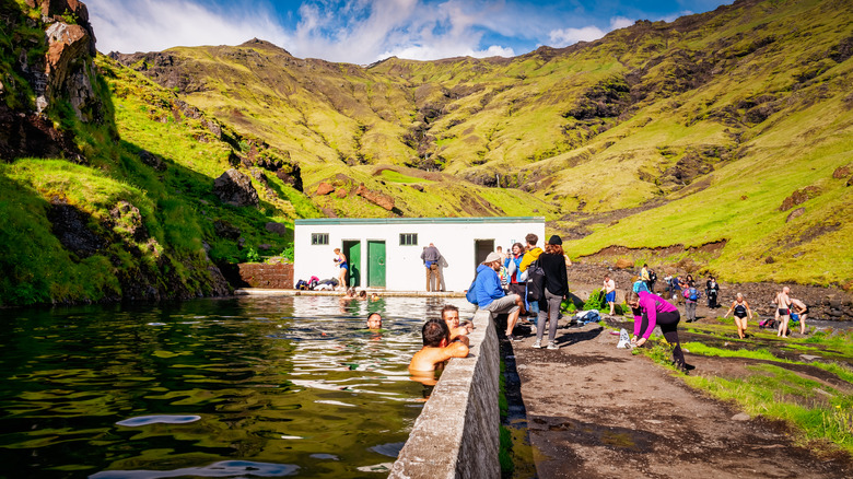 People around natural hot springs in Iceland