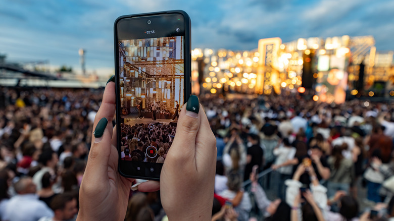 Crowd Recording Live Concert Performance On Multiple Smartphones