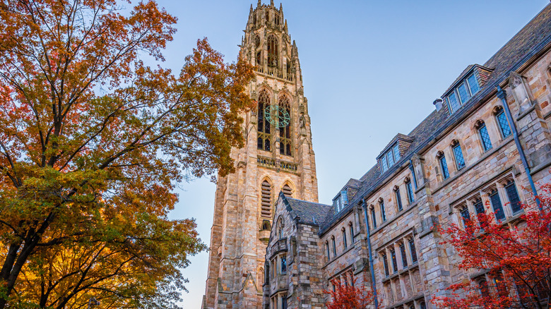 Yale's Harkness Tower surrounded by colorful fall foliage