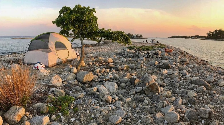 Tent set up on Shea Island at sunset