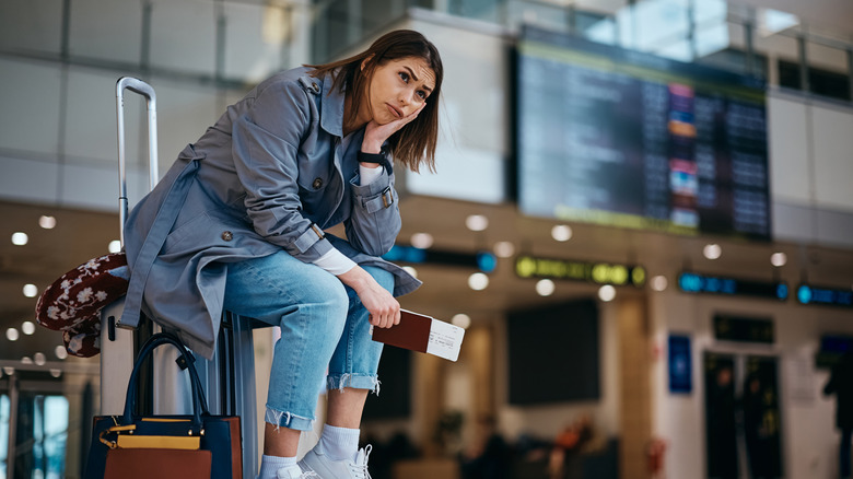 Person frustrated by airport delays