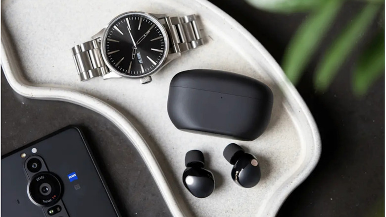A pair of Sony WF-1000XM5 wireless earbuds