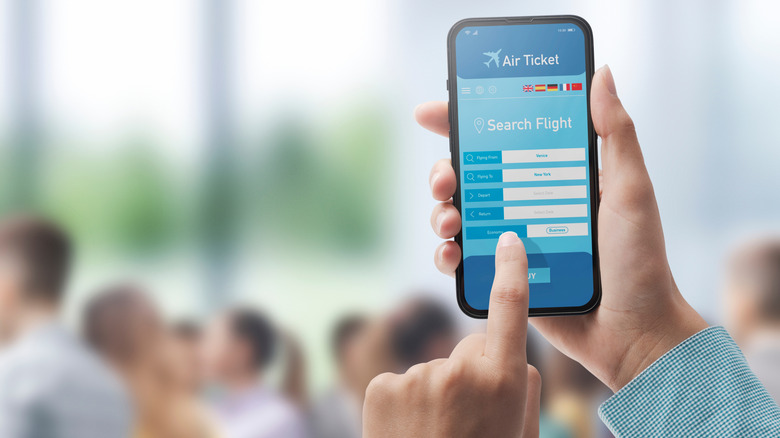 A person books travel plans online