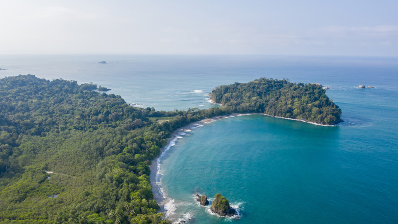 Jungle-covered headland pokes into sea at Manuel Antonio