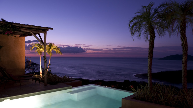 View of pool and rooms at a hotel in Tamarindo