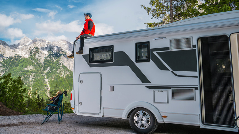 Person sitting on top of an RV