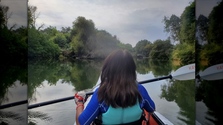 a kayaker paddling at Cosumnes River Preserve