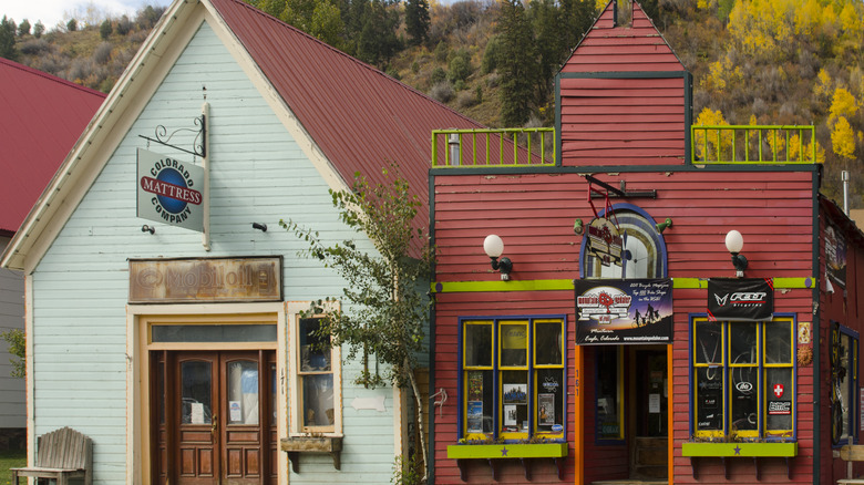Old western clapboard buildings line Main Street in Minturn