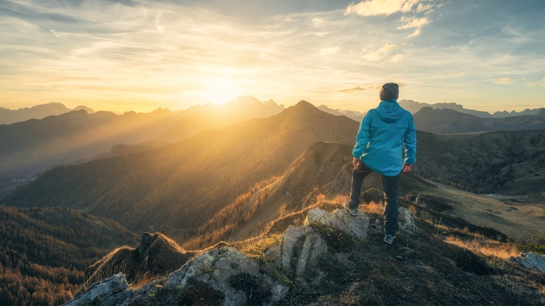 Man overlooking a mountain range