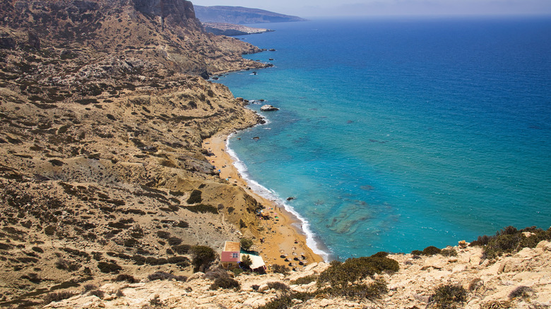A view down to Red Beach, sitting around the headland from Matala