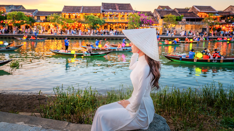 A woman wearing a traditional ao dai in Hoi An, Vietnam