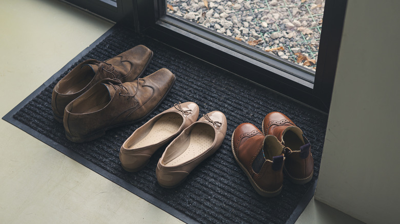 Shoes left by a door