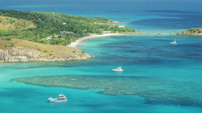 three cruise ships off the coast of Australia's Lizard Island