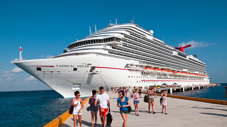 Cruise passengers disembarking on the dock in Cozumel, Mexico