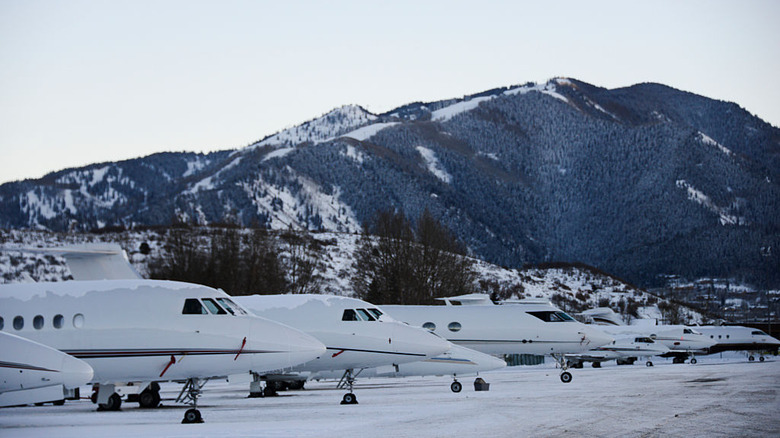 Planes at the snowy Aspen Airport in the Rockies