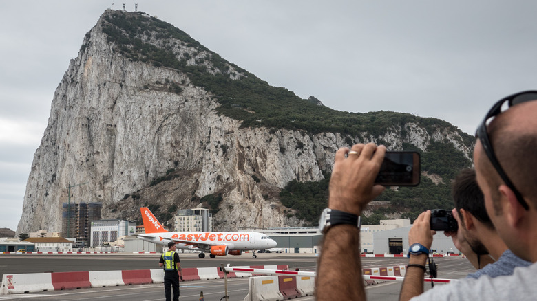 EasyJet flight on the runway against the Rock of Gibraltar