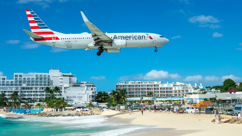 Plane flying over Maho Beach in St. Maarten