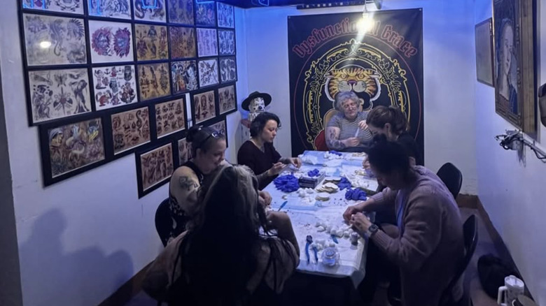 People attending a taxidermy class at Dysfunctional Grace