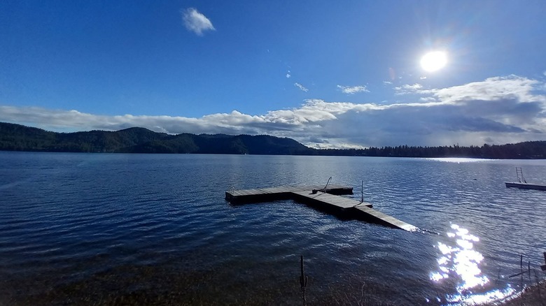 Deer Lake with sun and floating dock