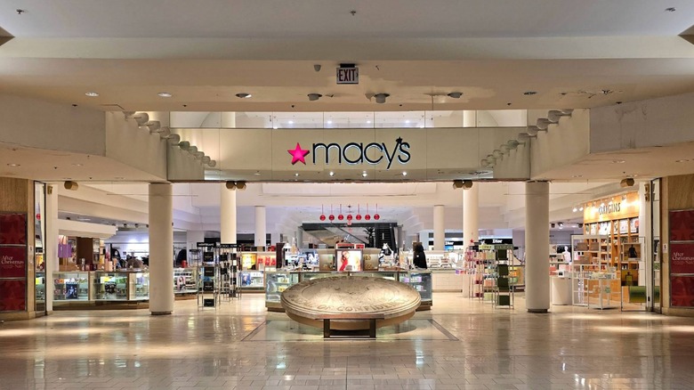 Seal of confidence in front of a brightly lit Macy's in Concord Mall, Delaware