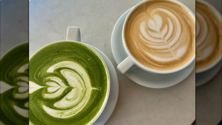 A latte and a match latte on a table